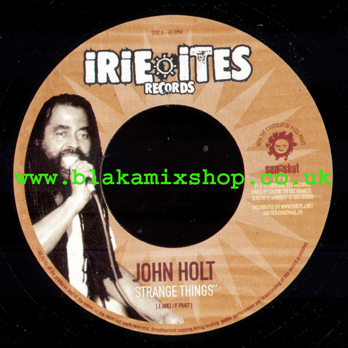 7" Strange Things/Strange All Over The World JOHN HOLT/TRINITY