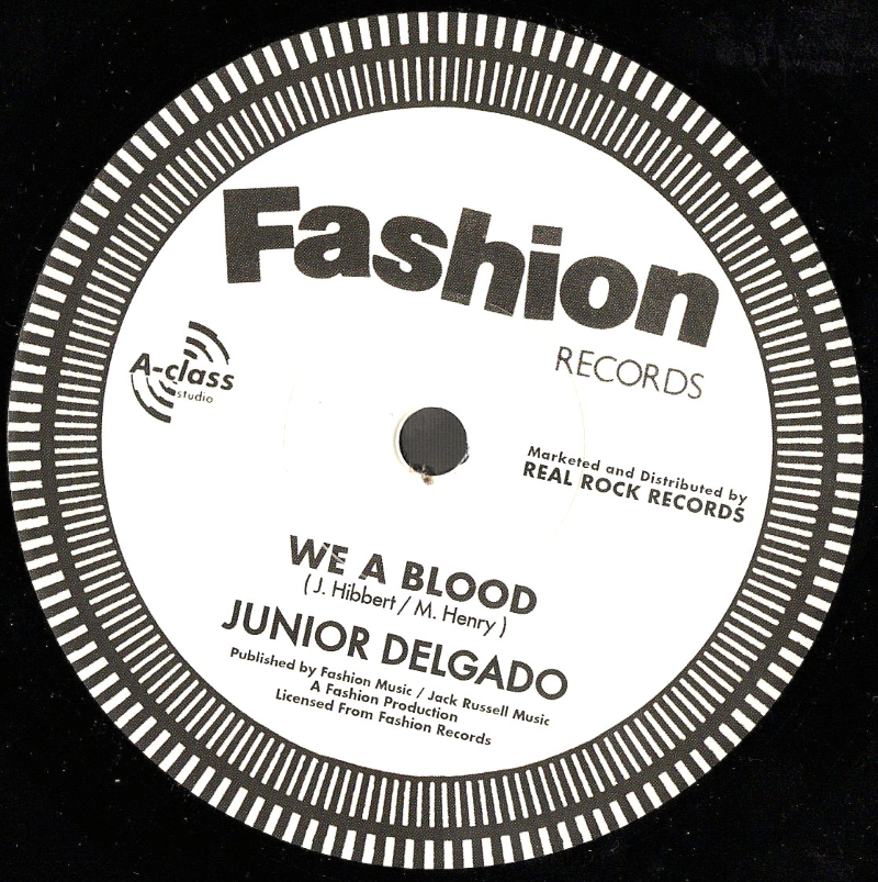 7" We A Blood/Blood Dub- JUNIOR DELGADO/DUB ORGANISER